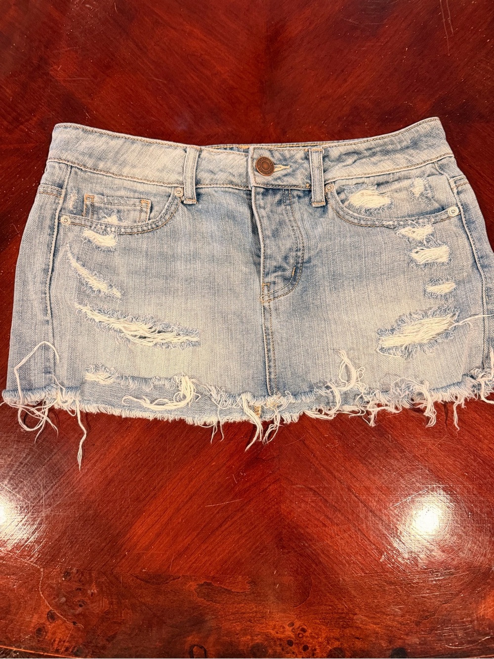 American Eagle Outfitters Light Wash Distressed Denim Mini Skirt